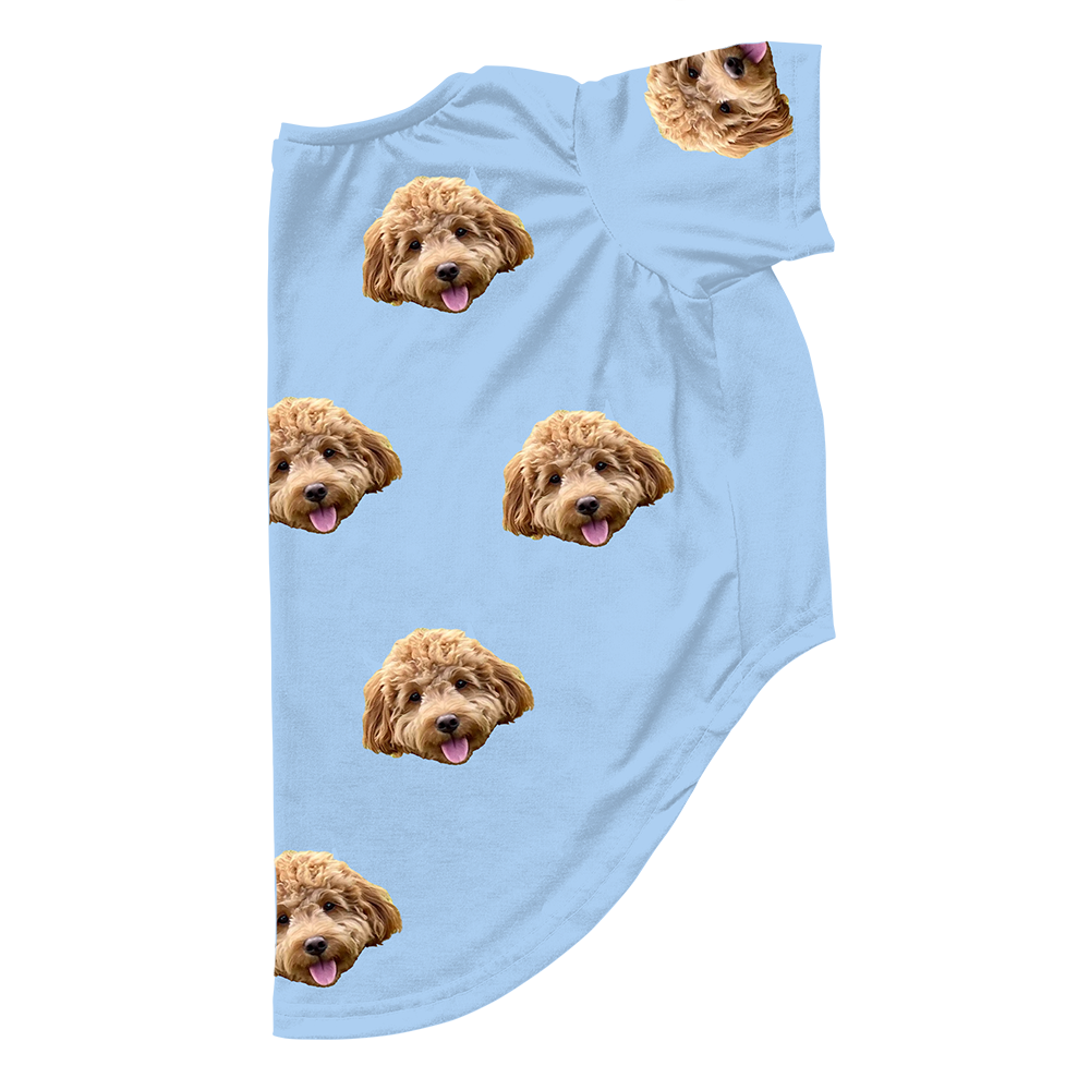 Sky blue dog pajama with repeating pet faces on them