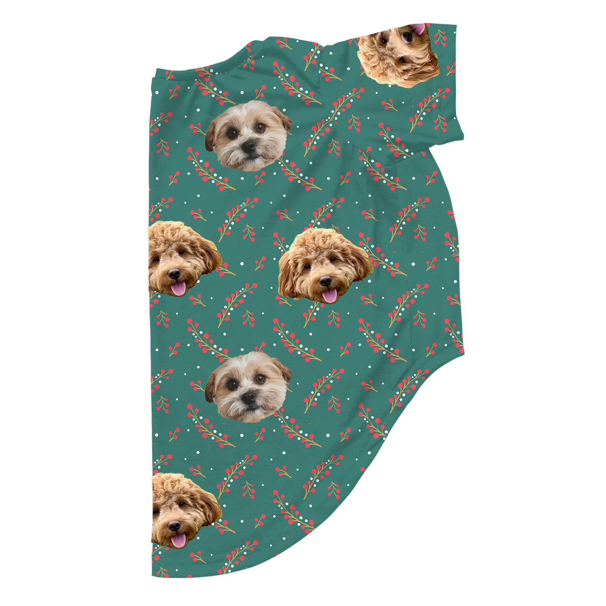 Green dog pajamas with a festive berries pattern and custom printed faces of two dogs arranged across the fabric.