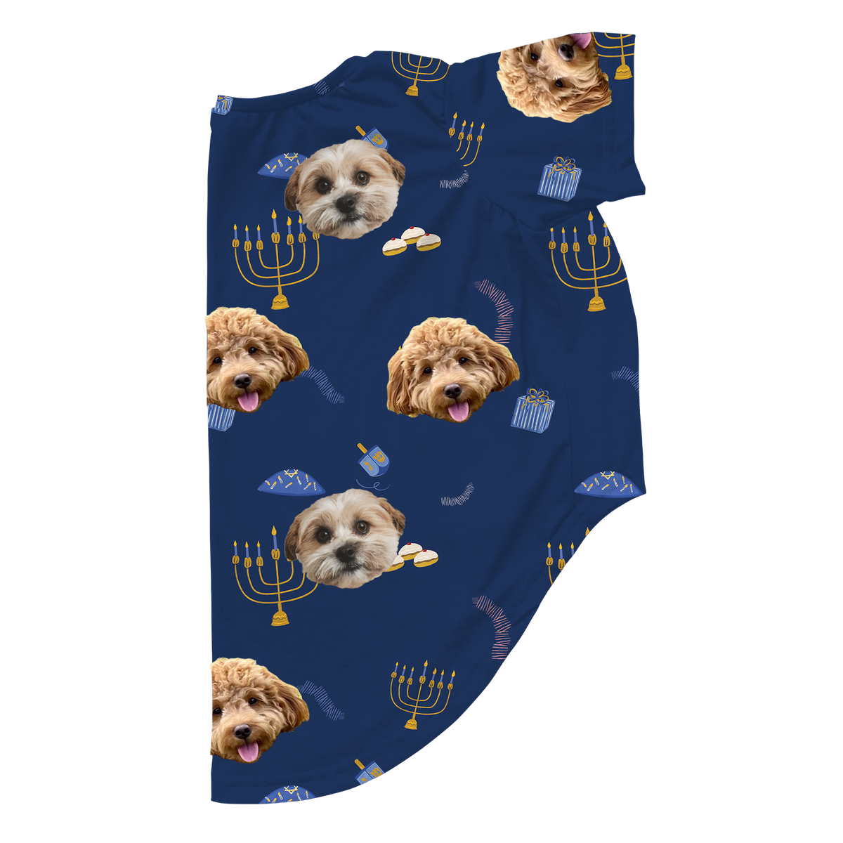 Custom dog pajamas featuring two pet faces on a dark blue Hanukkah-themed pattern with menorahs, dreidels, gifts, and holiday treats, laid flat to show the design.