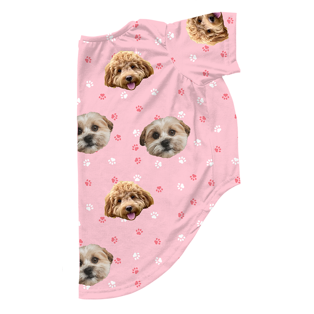 Light pink dog pajama with repeating pet faces on them[LightPinkPaws2Pets]