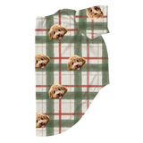 These are dog pajamas in a Light Christmas Flannel print with repeating pet faces on them[LightChristmasFlannelDogPajamas]