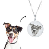 A custom engraved necklace featuring a portrait of a dog.