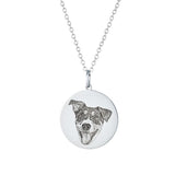 Silver circular dog-portrait necklace engraved.