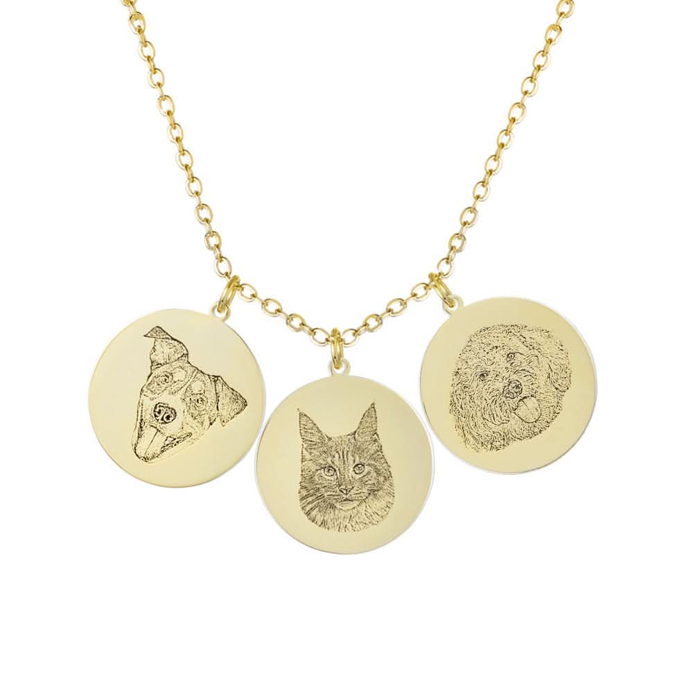 Yellow gold necklace with three circular pendants featuring a dog, cat, and doodle.