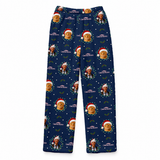 A pair of navy blue Christmas-themed lounge pants featuring a repeating pattern of Grinch illustrations in Santa hats, with 'The Grinch' text and small white stars and green holly accents.