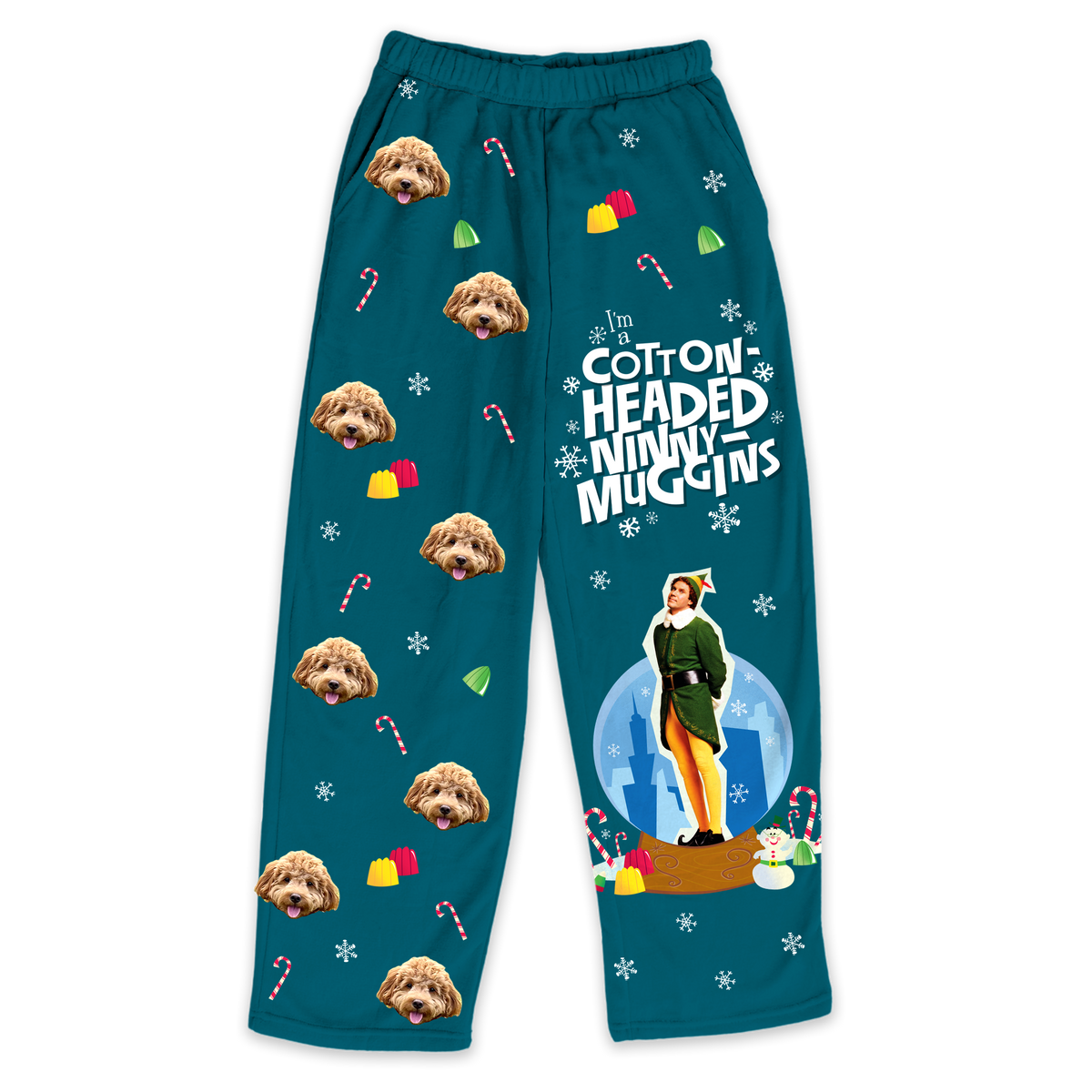 Teal fleece pajama pants featuring a repeating dog's face pattern, candy canes and gumdrops with the phrase "Cotton Headed Ninny Muggins" and an elf character.
