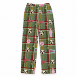 Kids’ green plaid fleece pants featuring custom dog portraits, pink Ralphie bunny suit figures, and A Christmas Story-inspired graphics on a white background.