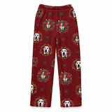A pair of kids' fleece pants in a deep red color, featuring an all-over print of Dalmatian dogs and circular portraits of George Washington surrounded by decorative gold and teal borders.