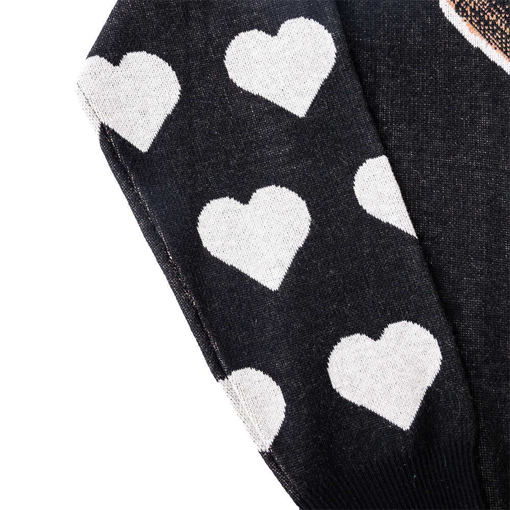 Close up of the black sweater sleeves with hearts