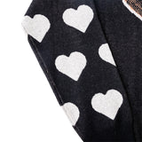 Close up of the black sweater sleeves with hearts