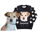 Black sweater with hearts on the sleeves, 'Frankie' dog sweater next to the actual dog.