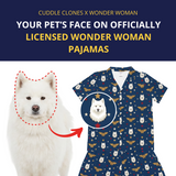 Dog with a Wonder Woman-themed pajama set featuring the dog's face on the front.