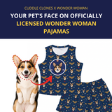 Pet pajamas with Wonder Woman design featuring a dog's face, branded by Cuddle Clones x Wonder Woman.