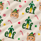 Close-up of the Iconic Elf print showing custom pet faces in elf hats with Elf lettering and candy canes on a cream fabric