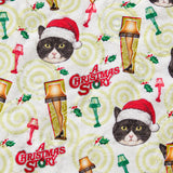 Close-up of the Iconic Leg Lamp print showing custom pet faces in Santa hats with leg lamps and movie lettering on a cream fabric
