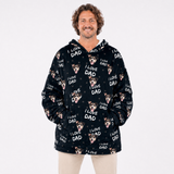 Person wearing a black blanket hoodie with 'I Love Dad' text and dog images on a white background