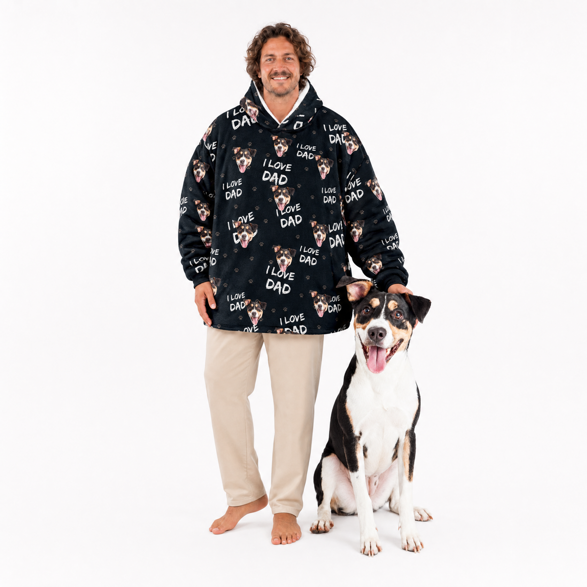 Man wearing a black 'I Love Dad' blanket hoodie with a dog on a white background