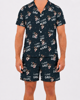 Person wearing a navy blue pajama set with 'I Love Dad' and dog pattern on a white background