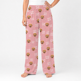 Pink pajama pants with dog pattern and 'I love mom' text on a white background