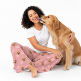 I love mom theme – person in dog-print pajamas hugging golden retriever.