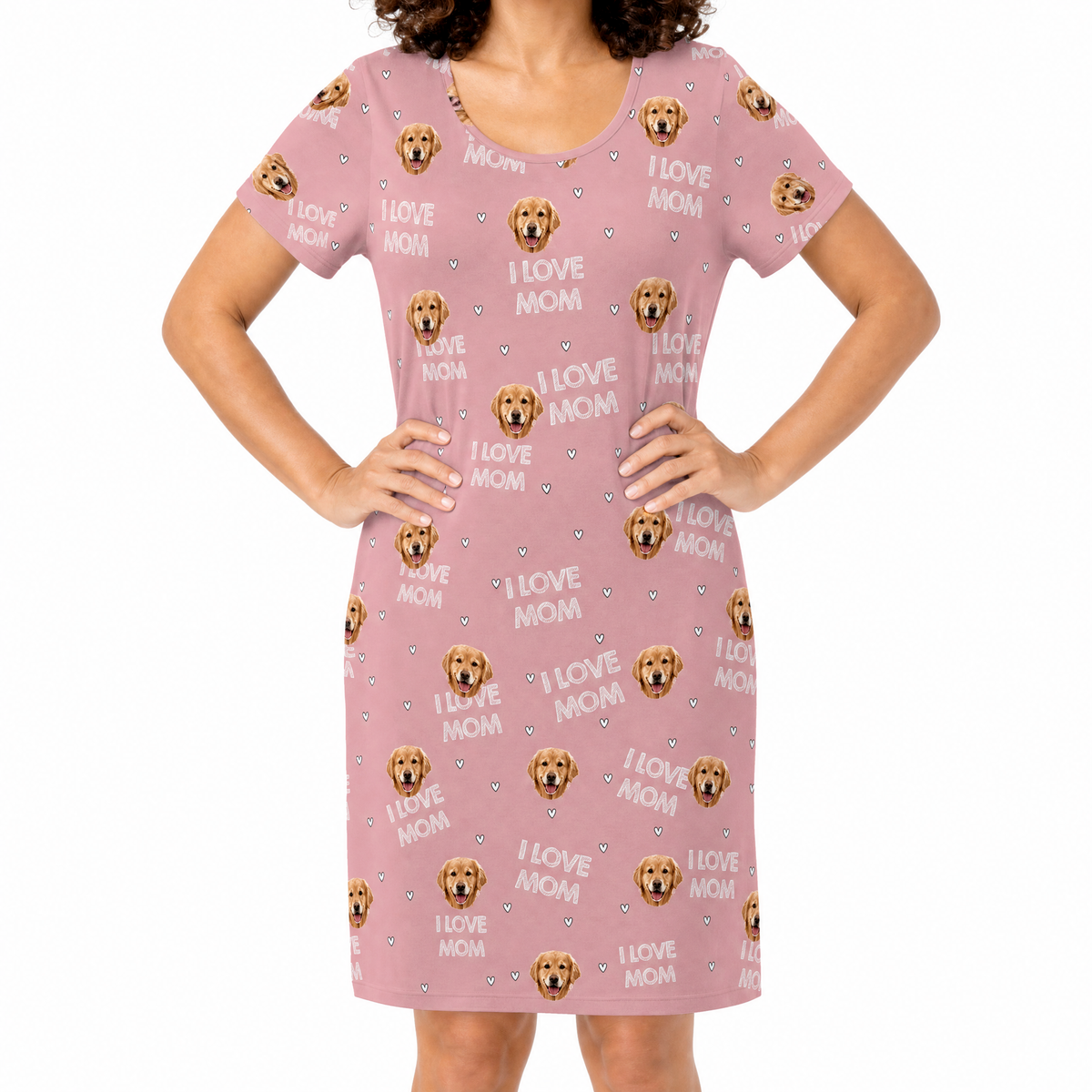 Pink nightgown with 'I Love Mom' and dog pattern worn by a person on a white background