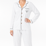 Ivory pajama set with a dog illustration on a white background