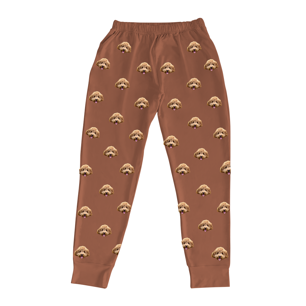 These are jogger pajama pants in a brown color with repeating pet faces on them[JoggerPajamaPants]