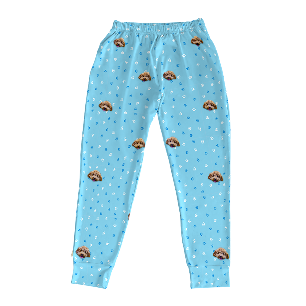 These are jogger pajama pants in a light blue color with repeating pet faces on them[JoggerPajamaPants]