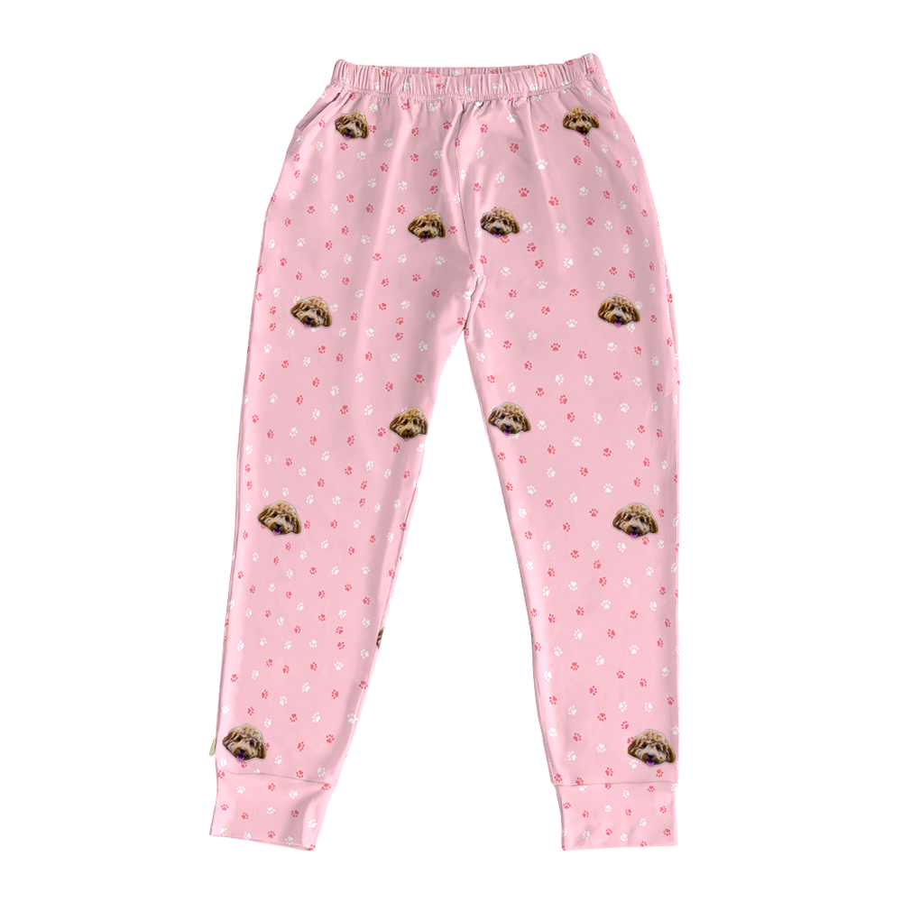 These are jogger pajama pants in a light pink color with repeating pet faces on them[JoggerPajamaPants]