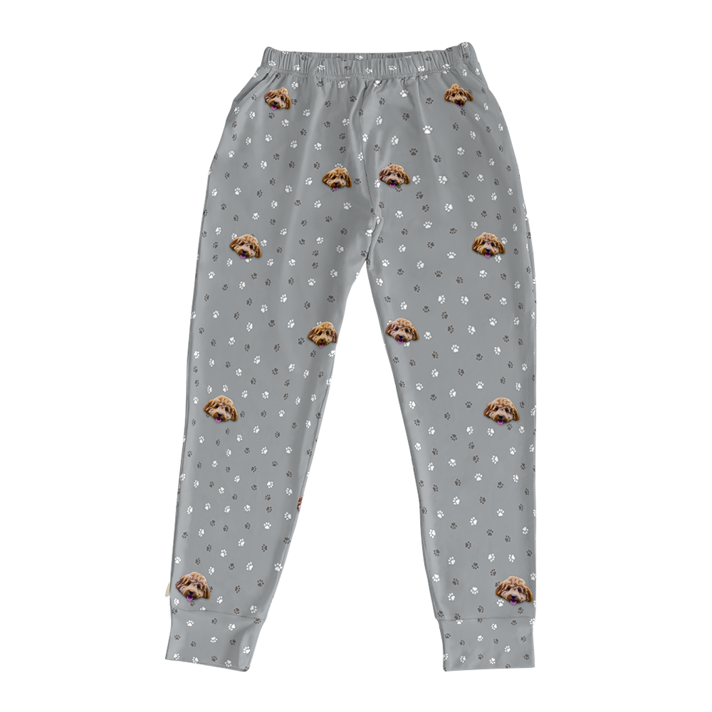 These are jogger pajama pants in a gray color with repeating pet faces on them[SlateGrayPawsJoggerPajamaPants]