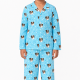 Light blue pajama set with dog pattern on a white background
