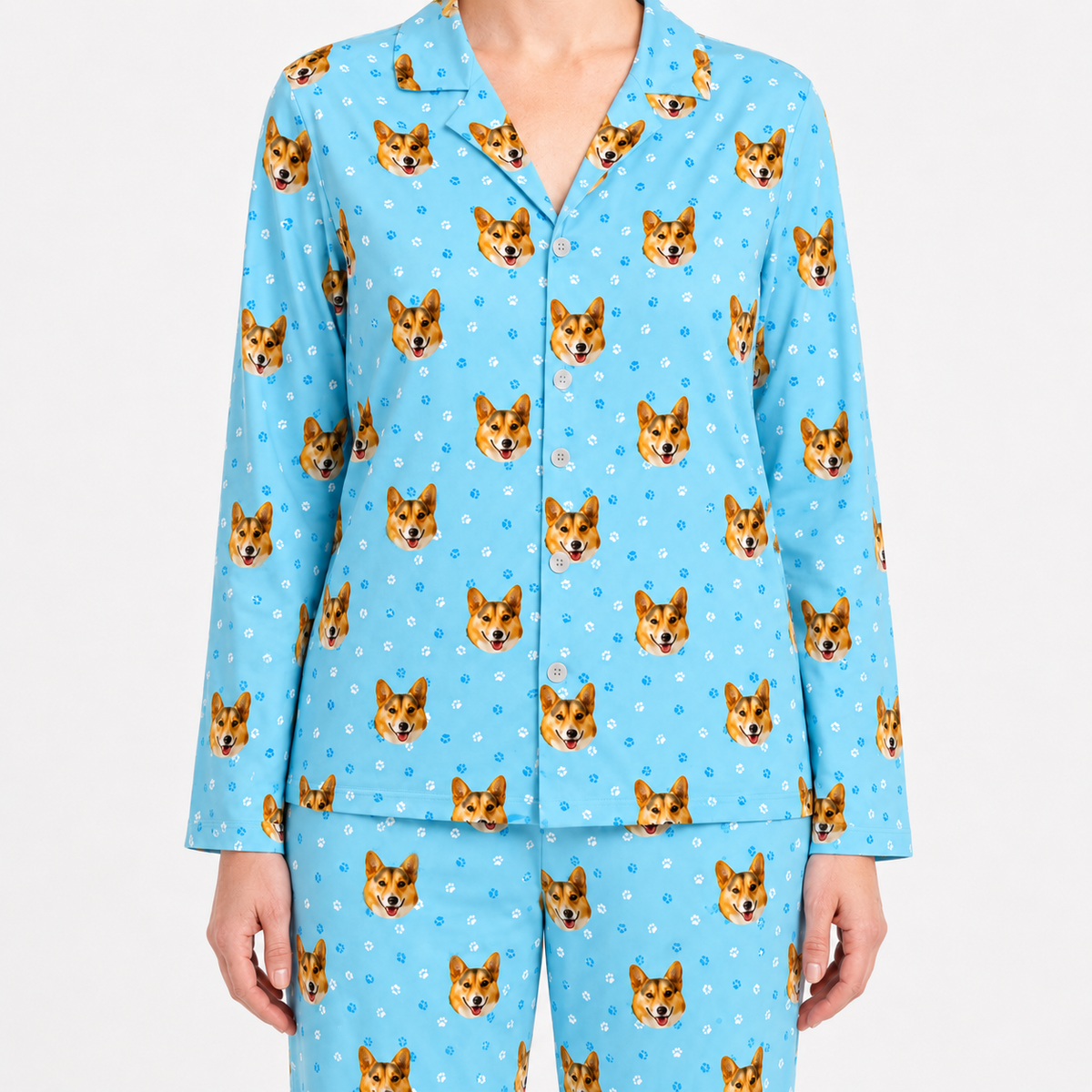 Light blue paws pajama set with corgi pattern on a white background
