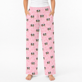 Pink pajama pants with a dog pattern on a white background