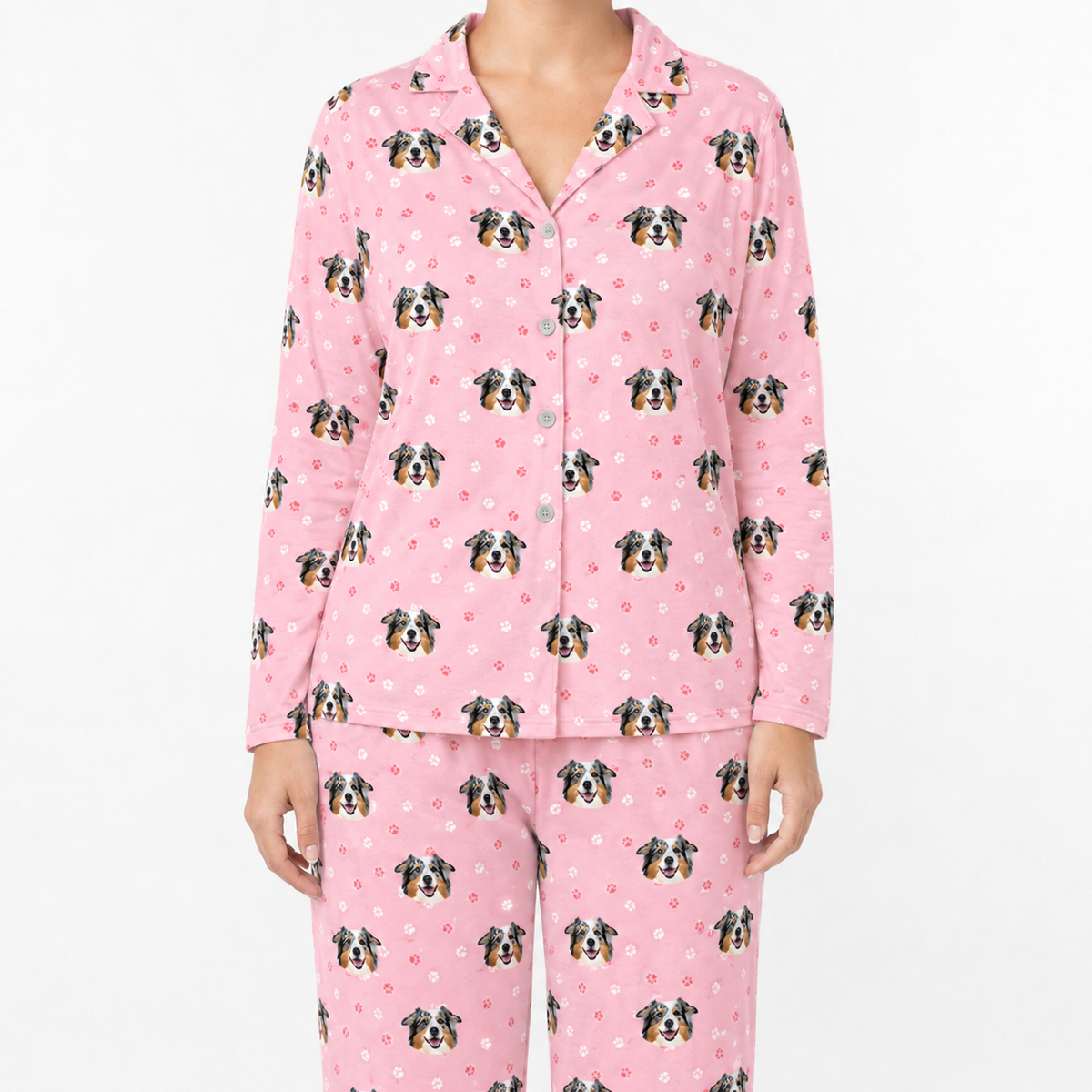 Light pink paws pajama set with dog pattern on a white background