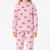 Pink jogger pajama set with dog pattern on a white background