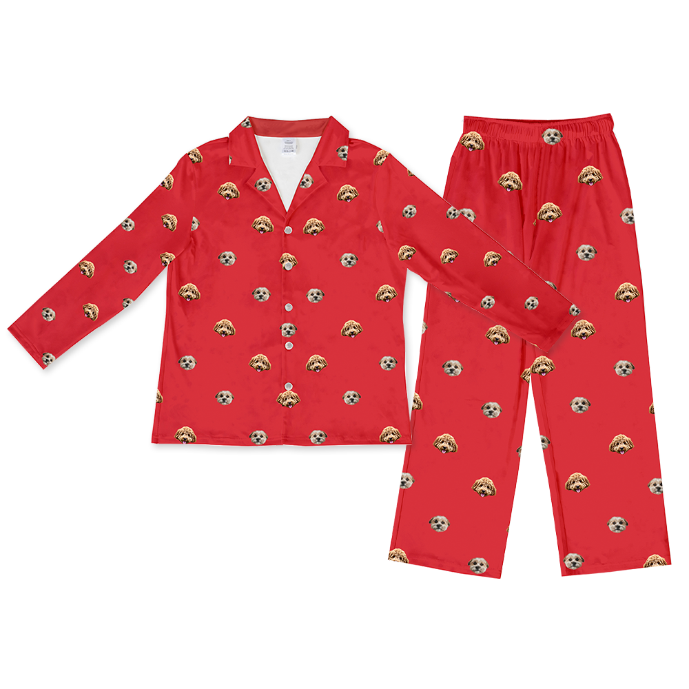 A two-piece personalized long-sleeved pajama set, featuring a red fabric with a repeating custom print of two different small dog faces on both the button-down top and the elastic-waist pants.