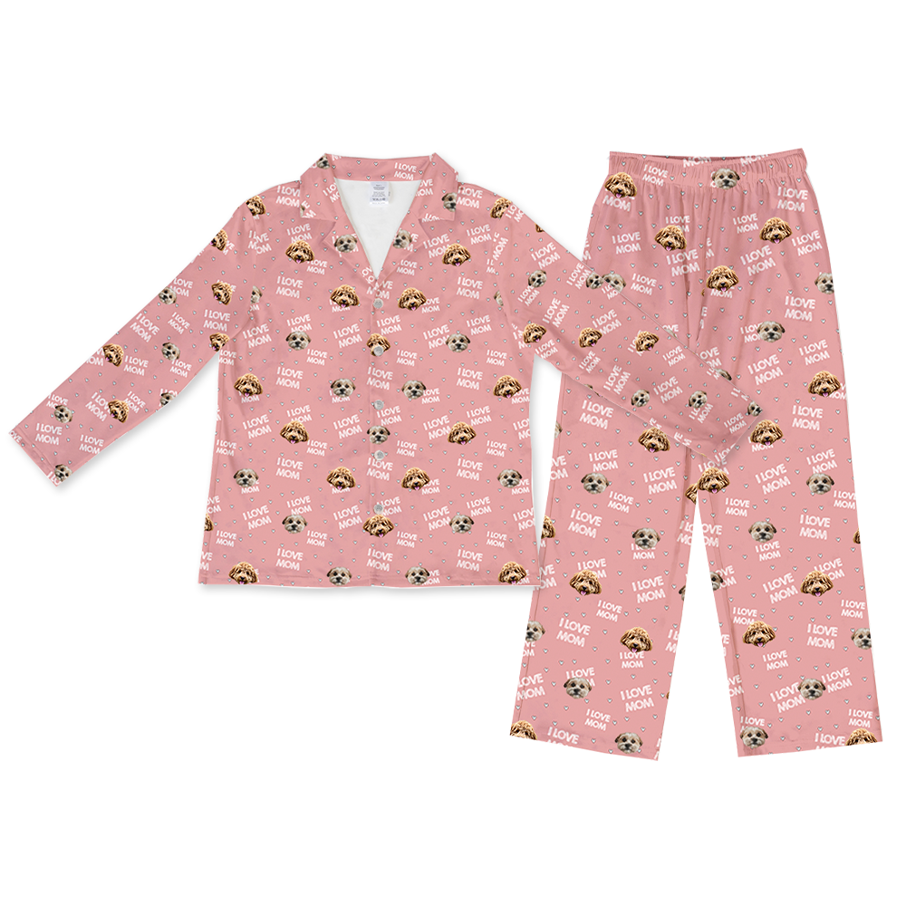 Long-sleeve pajama set in light pink, featuring a repeating pattern of the phrase "I LOVE MOM" and faces of two different dogs on both the button-down top and full-length pants.