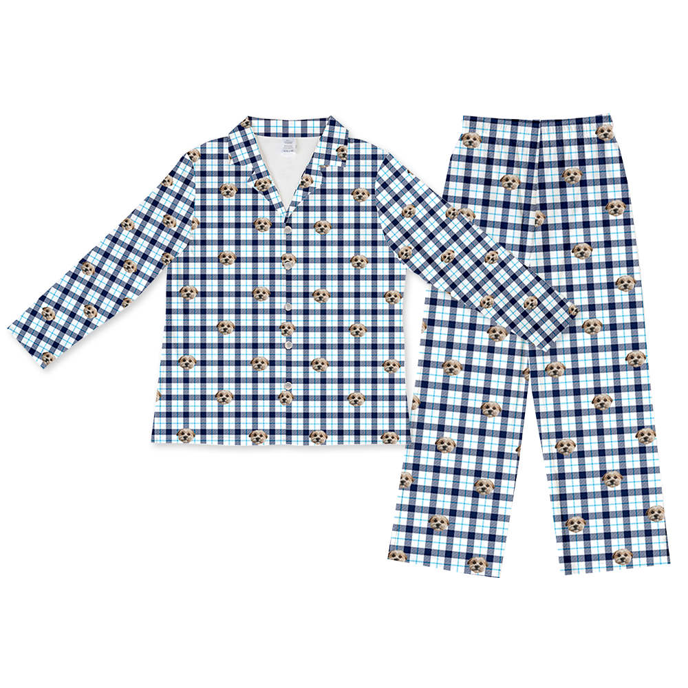 Blue and white plaid long-sleeve pajama set with a button-down top and matching pants, decorated with an all-over pattern of a single dog’s face.