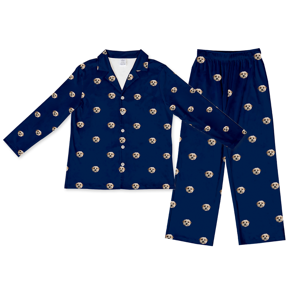 Solid navy long-sleeve pajama set with a button-down top and matching pants, decorated with an all-over pattern of a single dog’s face.