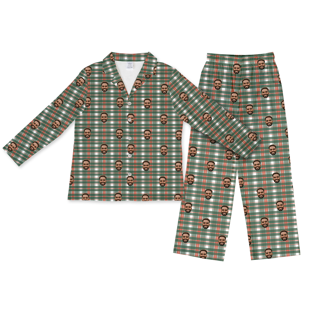 Green, red, and white plaid long-sleeve button-up pajama top with matching pants, decorated with a repeating pattern of the same smiling man’s face across the fabric.