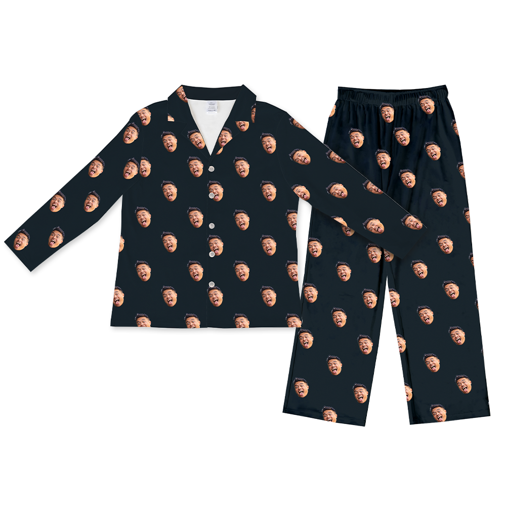 Black long-sleeve button-up pajama top with matching pants, decorated with a repeating pattern of the same man making a funny, wide-mouth expression across the fabric.