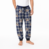 Plaid pajama pants with dog faces on a white background