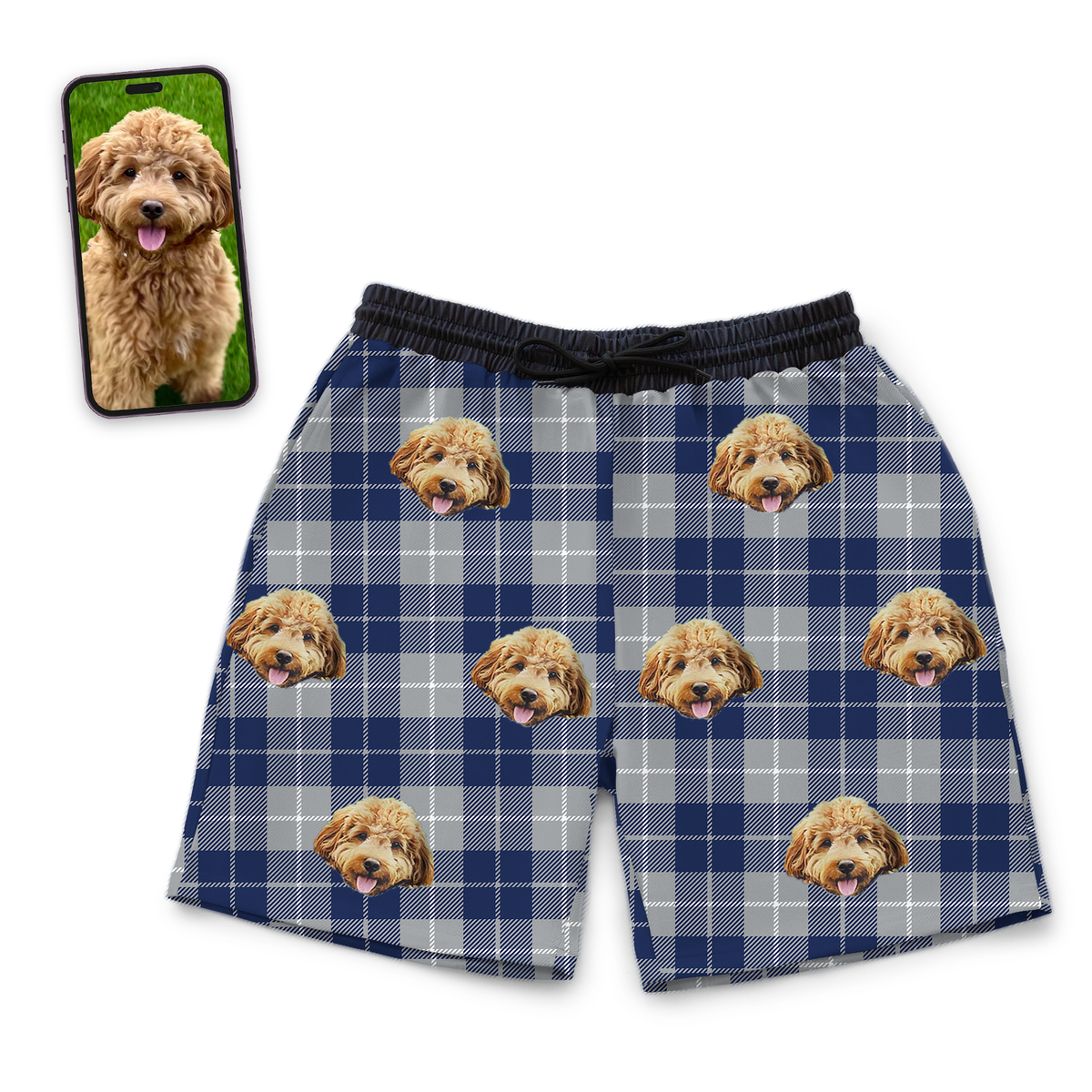 Custom navy and gray plaid sweatshorts featuring a repeated printed pattern of a happy curly-haired dog’s face, shown next to the original dog photo displayed on a smartphone.