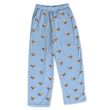 These are pajama pants in a sky blue color with repeating pet faces on them