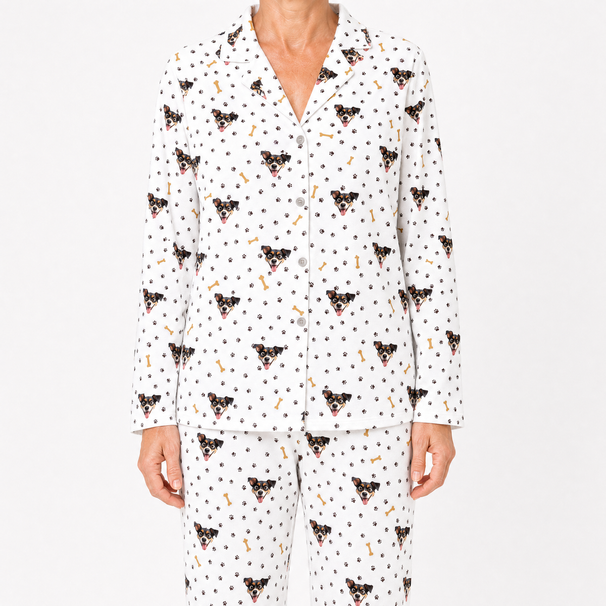 White pajama set with black dog pattern on a white background