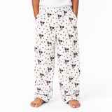 Pajama pants with dog and bone pattern on a white background