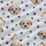 Close-up of the Paws and Bones print showing custom pet faces with brown paw prints and dog bones on a white fabric