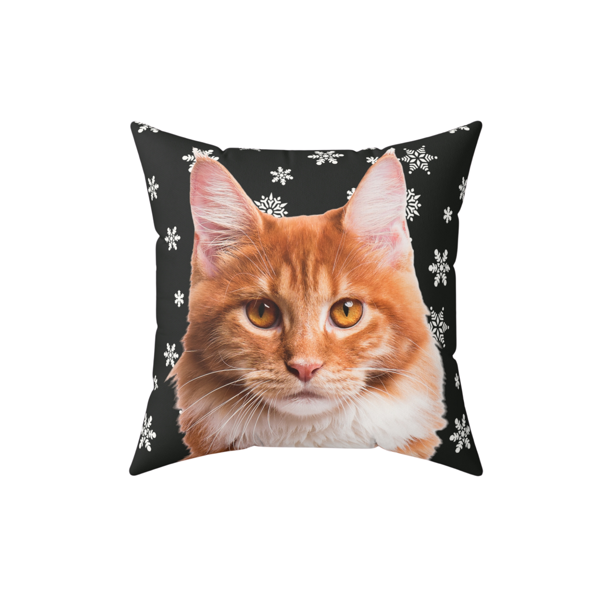 Pillow with a cat face design on a black background with white snowflakes