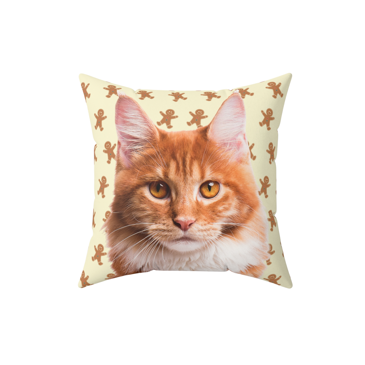 Square throw pillow featuring a realistic orange tabby cat on a light cream background patterned with repeating gingerbread man illustrations.