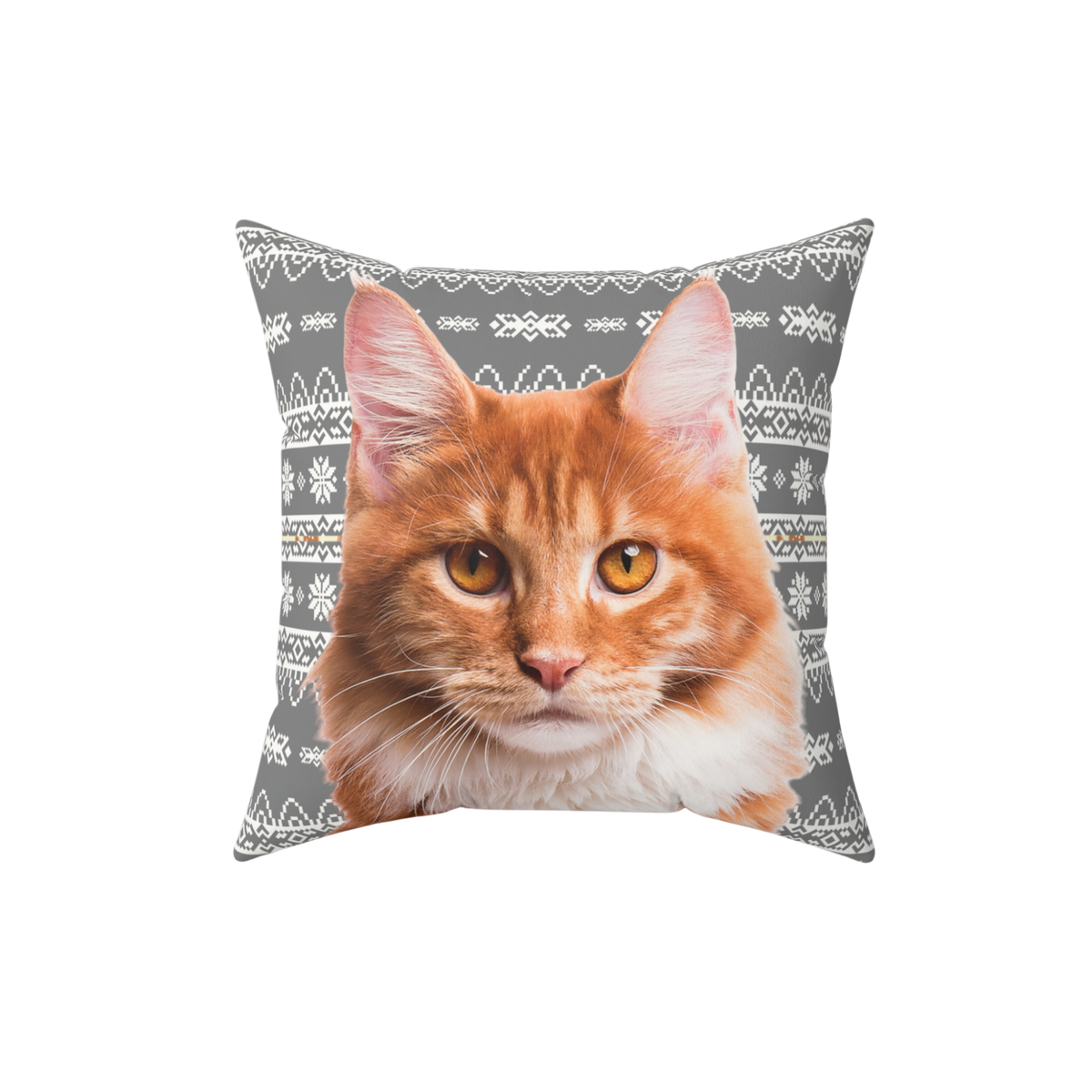 Square throw pillow featuring a realistic orange tabby cat on a gray background with white holiday sweater–style patterns, including snowflakes and geometric designs.